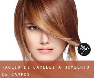 Taglio di capelli a Humberto de Campos